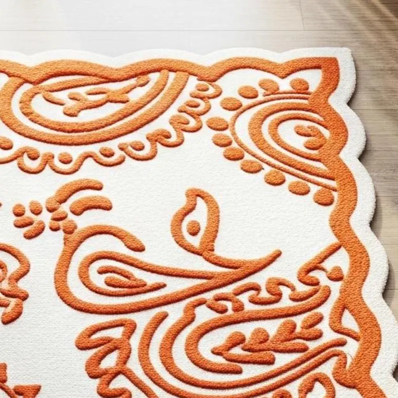 Ivory and Orange Scalloped Edge Floral Wool Area Rug