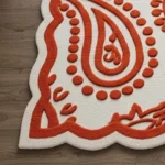 Ivory and Orange Scalloped Edge Floral Wool Area Rug